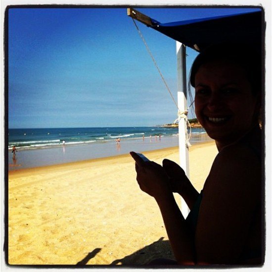 Caught by Mr. O tweeting, or checking Facebook. I *did* have wifi at the beach ;)